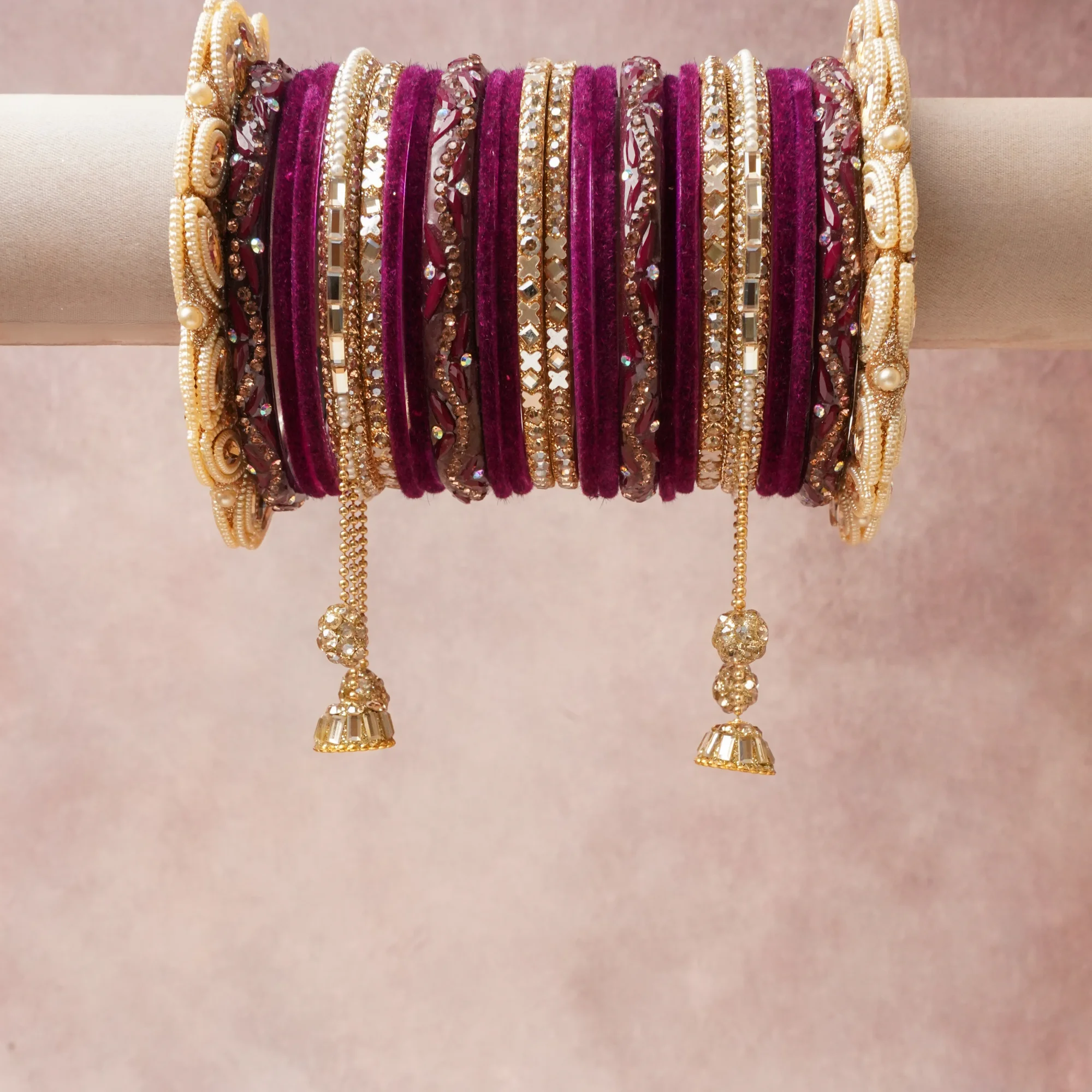 A commanding Deep Magenta anchors this beautiful set, enriched with accents of Gold, Silver Mirror, Cream Pearl that add depth and dimension.

Featuring a striking composition of Velvet, Gold-Toned Metal, Mirror Glass, Faux Pearl, Rhinestones, Textile Embroidery, this set carries intricate craftsmanship and strong presence. Grand in form, it is created for moments that deserve to be marked.